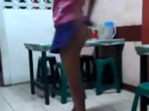 Indonesian girl flashing her body in food stall